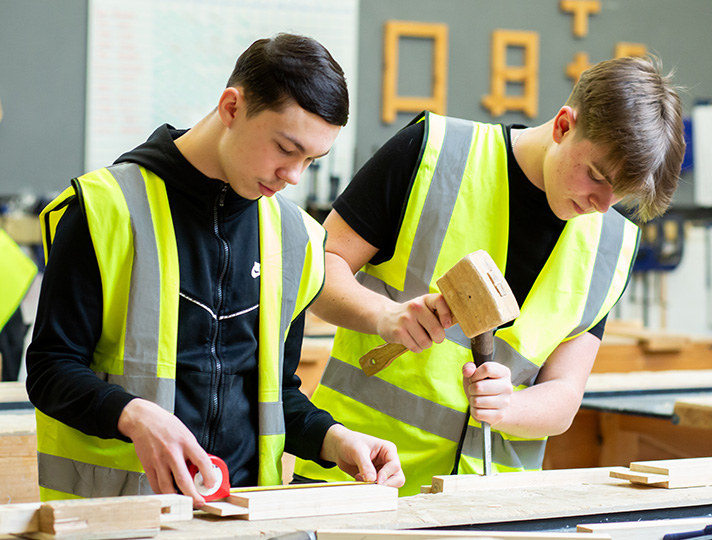 Students studying in a workshop