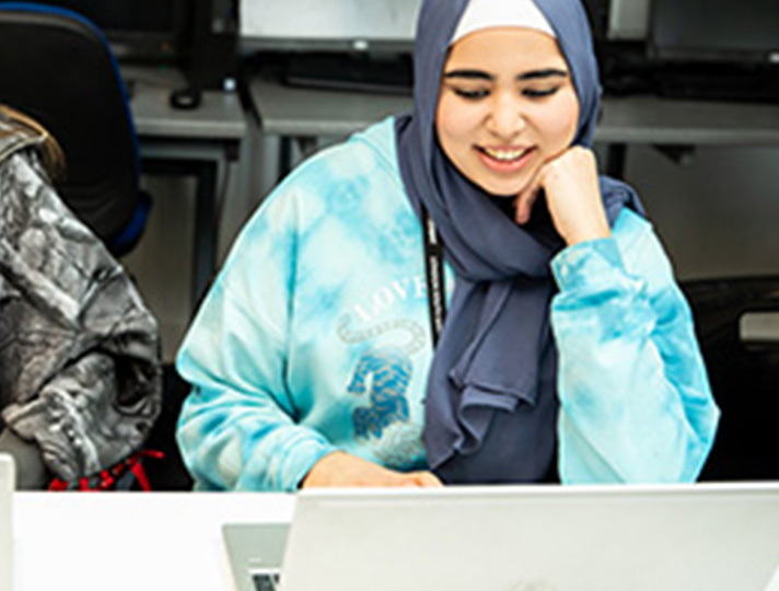 Student studying on laptop